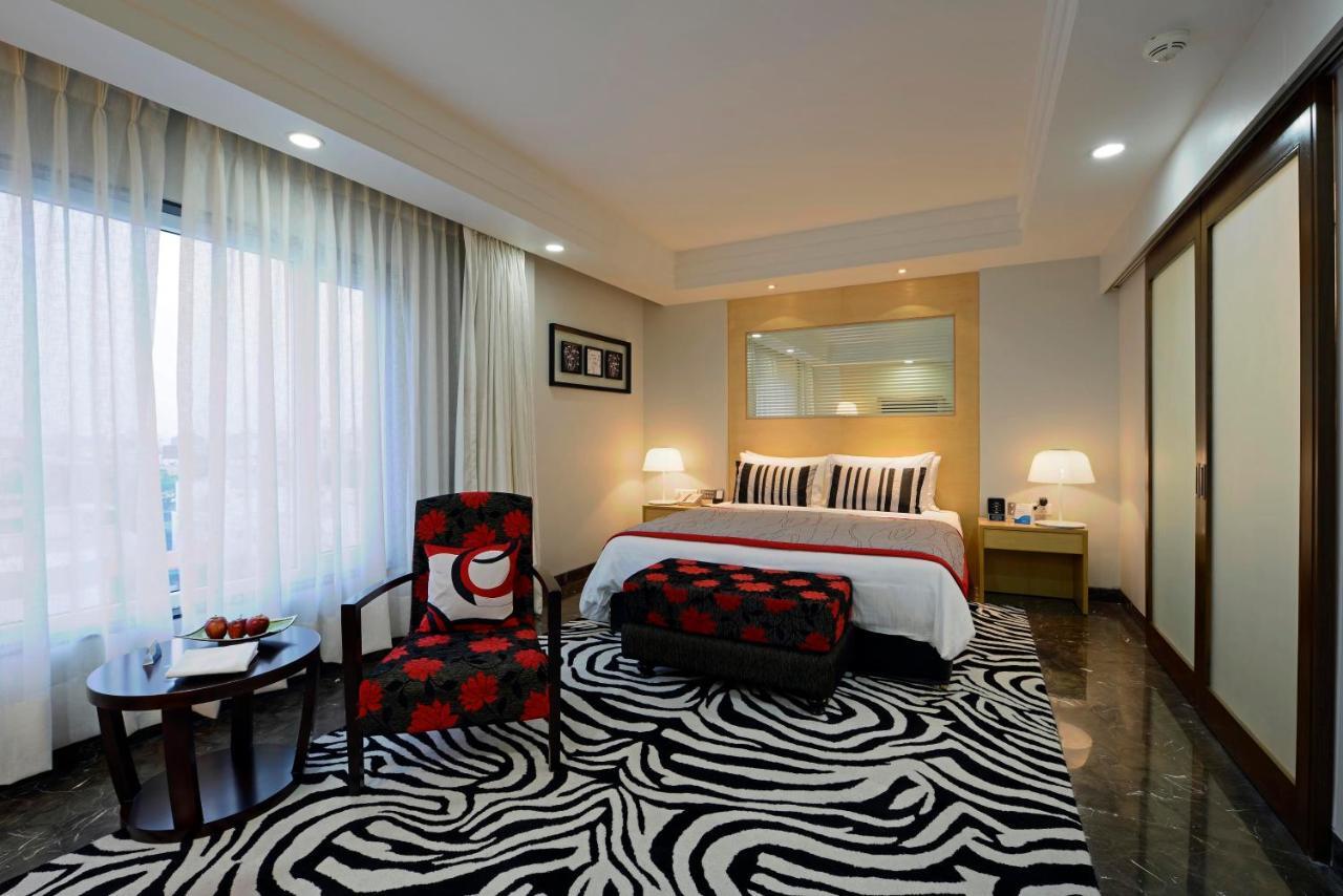 Radisson Blu Hotel Ahmedabad Quarto foto A room at the Taj Bengal